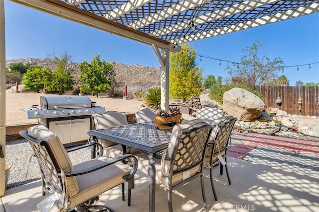 view of patio / terrace featuring a pergola