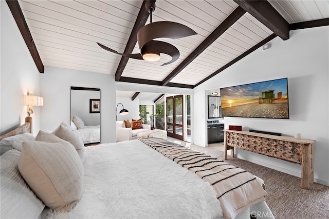 bedroom with ceiling fan, carpet floors, and vaulted ceiling with beams