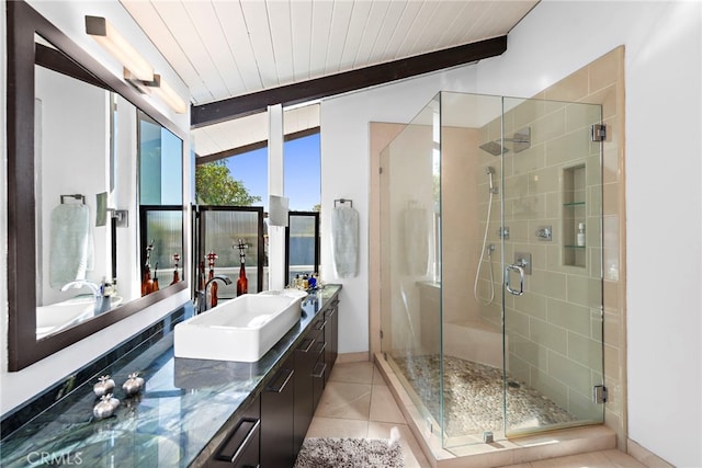 bathroom with walk in shower, vaulted ceiling with beams, wooden ceiling, vanity, and tile patterned flooring