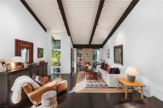 living room with wood ceiling, beam ceiling, a fireplace, and hardwood / wood-style flooring