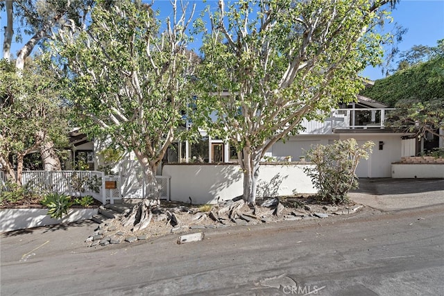 obstructed view of property with a porch