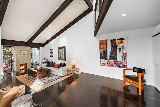 living room with beam ceiling, a fireplace, high vaulted ceiling, and wood-type flooring