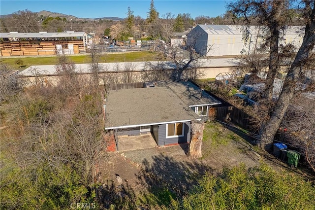 birds eye view of property with a mountain view