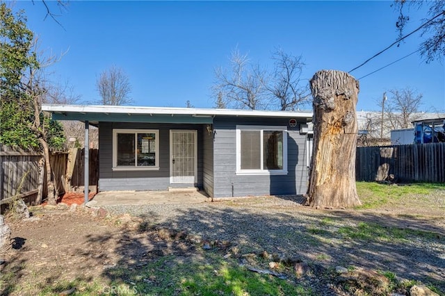 view of front of home with fence