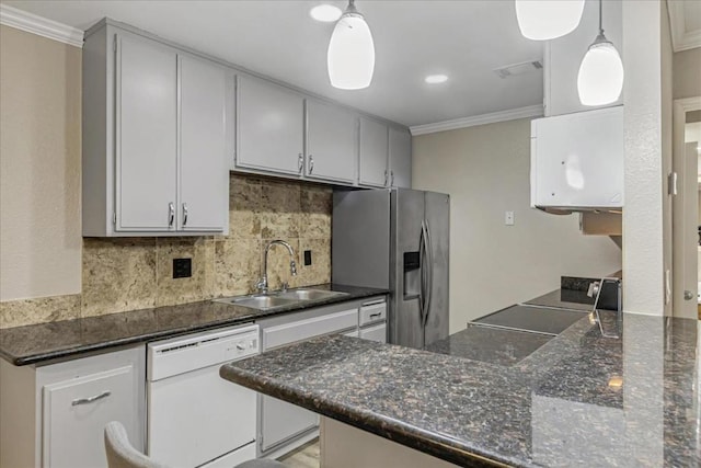 kitchen featuring decorative light fixtures, dishwasher, sink, ornamental molding, and stainless steel refrigerator with ice dispenser