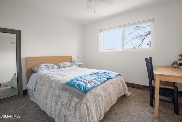 bedroom with ceiling fan and carpet