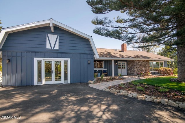 back of property featuring french doors