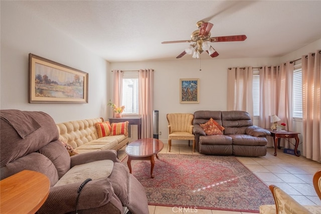 tiled living room featuring ceiling fan