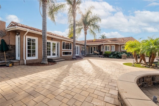 rear view of house with french doors