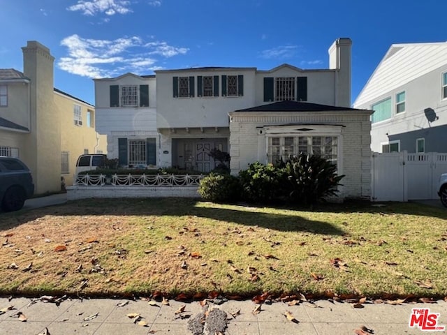 exterior space with a front lawn