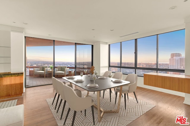 dining room featuring light hardwood / wood-style floors