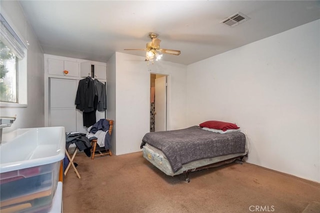 bedroom with carpet floors and ceiling fan