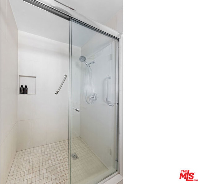 bathroom with an enclosed shower