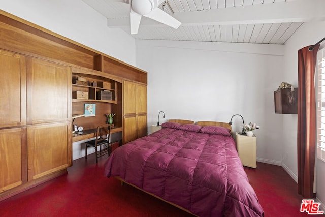 bedroom featuring beamed ceiling and ceiling fan