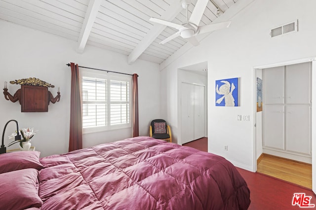 bedroom with vaulted ceiling with beams, wooden ceiling, and ceiling fan