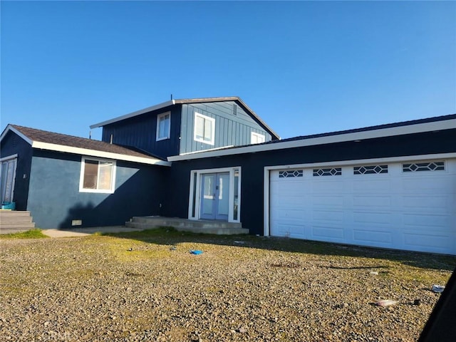 front of property with a garage