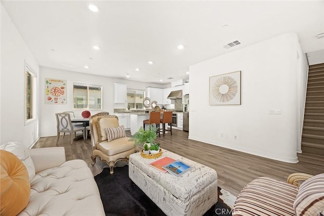 living room featuring dark hardwood / wood-style floors