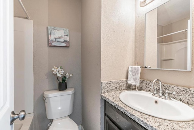 full bathroom with vanity, shower / bathing tub combination, and toilet