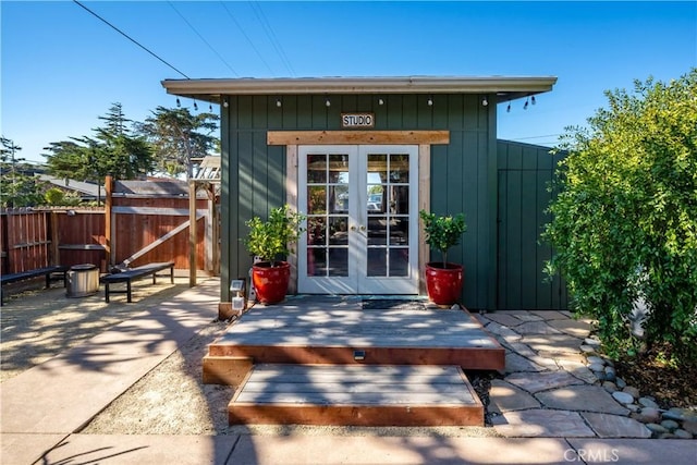 view of outbuilding with french doors