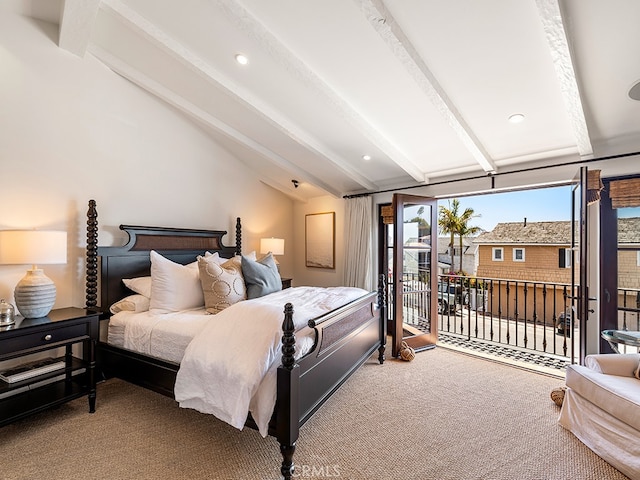 bedroom featuring carpet, vaulted ceiling with beams, and access to outside