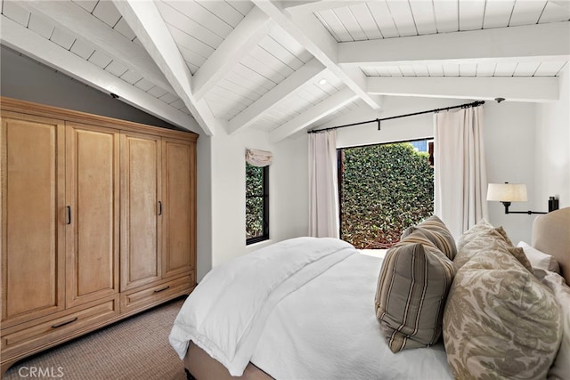 bedroom featuring vaulted ceiling with beams and light colored carpet