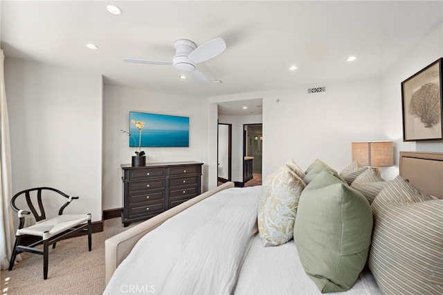 bedroom featuring light carpet and ceiling fan