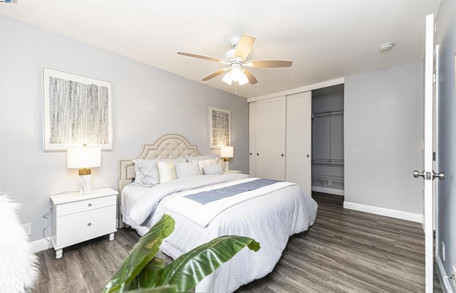 bedroom featuring dark wood-type flooring and ceiling fan