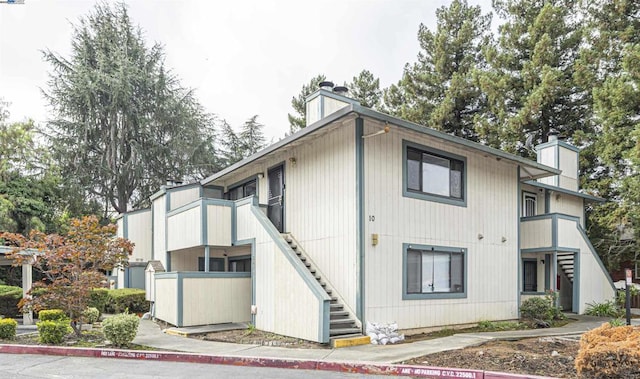 view of property exterior featuring a balcony