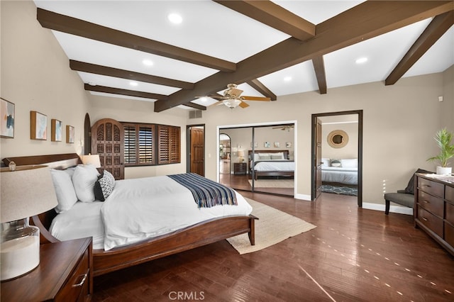 bedroom with ceiling fan, beam ceiling, and dark hardwood / wood-style flooring