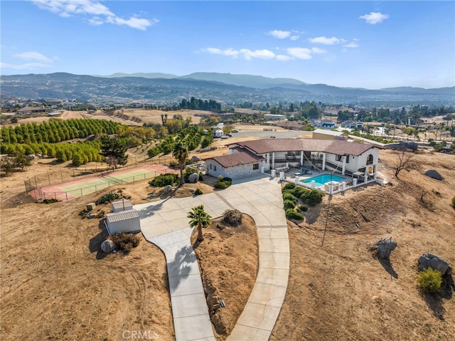 bird's eye view with a mountain view and a rural view