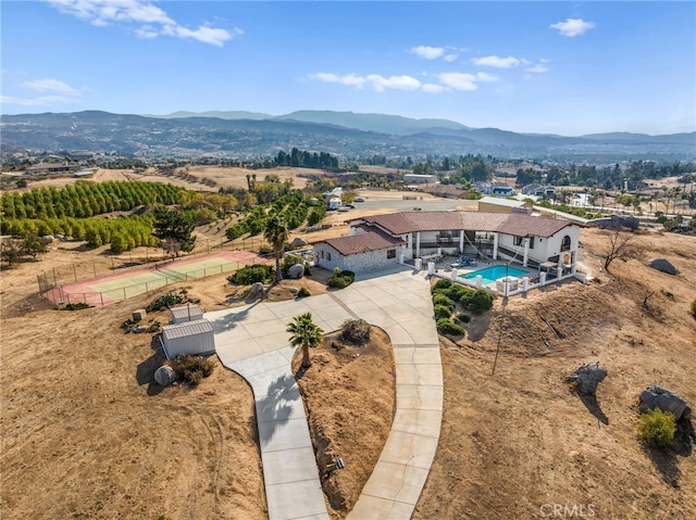 aerial view featuring a mountain view and a rural view