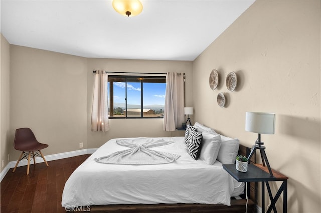 bedroom featuring dark wood-type flooring