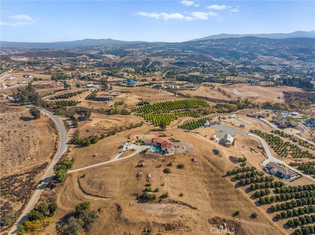 aerial view with a mountain view and a rural view