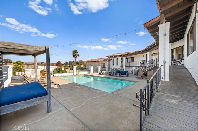 view of swimming pool featuring a patio area