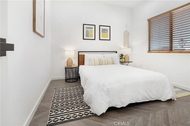 bedroom featuring parquet floors