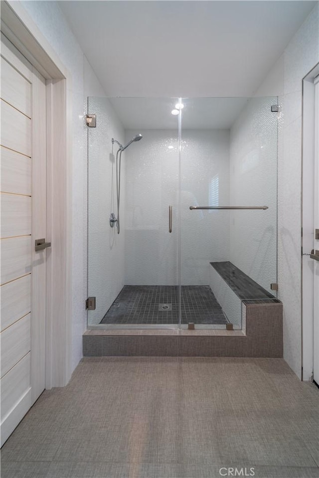 bathroom featuring walk in shower