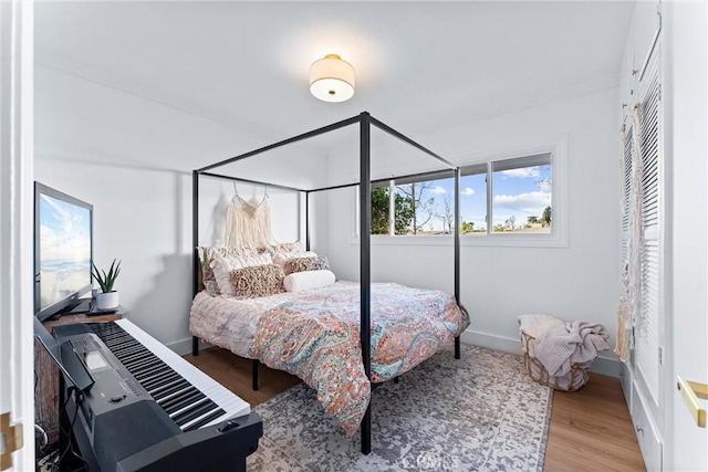 bedroom with light wood-type flooring