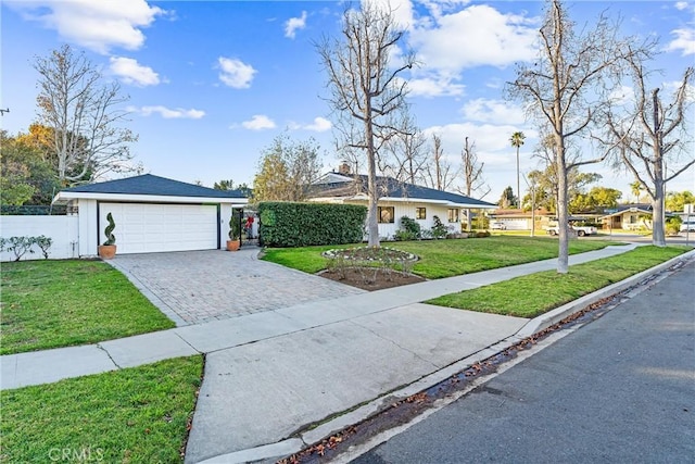 ranch-style home featuring a front yard