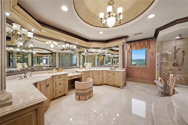 bathroom featuring an enclosed shower, vanity, ornamental molding, a raised ceiling, and a notable chandelier