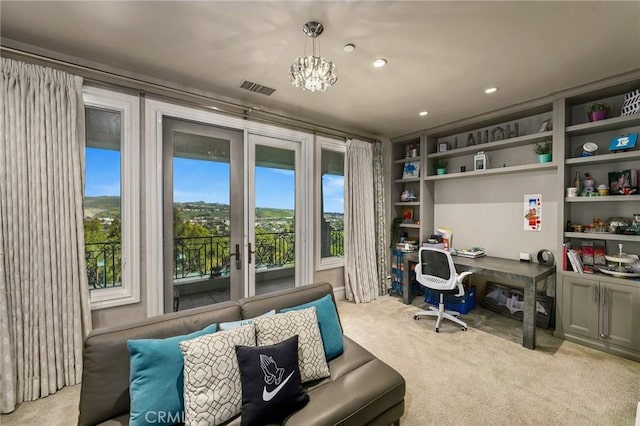 office area featuring light carpet