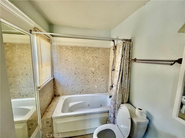 1143 S Manhattan Pl, Los Angeles, CA 90019 - bathroom featuring toilet and a combined bath / shower with jetted tub