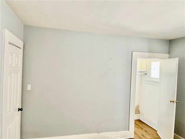 1143 S Manhattan Pl, Los Angeles, CA 90019 - empty room featuring light wood-type flooring