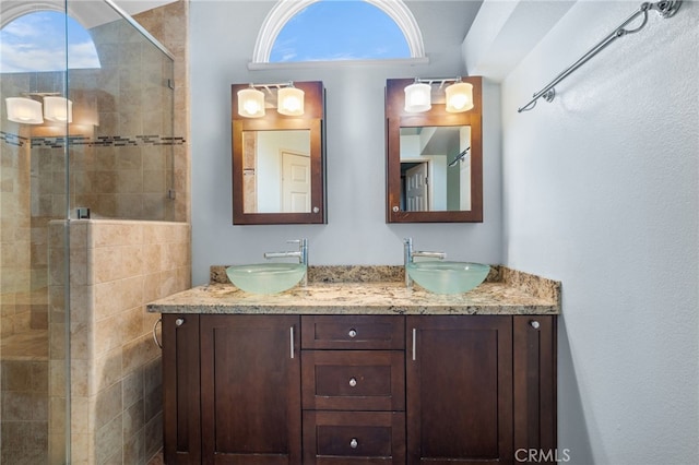 bathroom featuring vanity and walk in shower