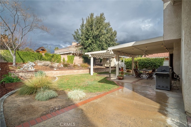 view of yard featuring a patio and a pergola