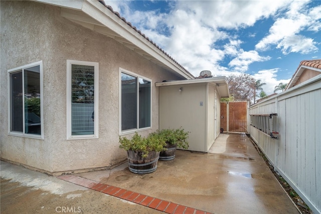 view of home's exterior with a patio