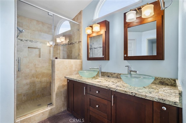 bathroom with vanity and walk in shower