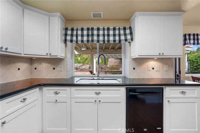 kitchen featuring sink, a wealth of natural light, dishwasher, and white cabinets