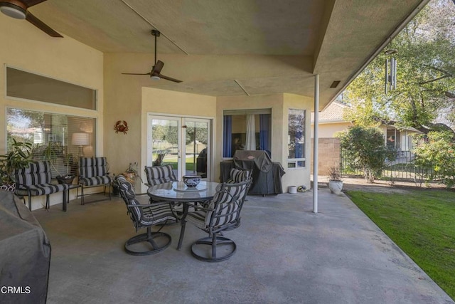 view of patio / terrace with ceiling fan and grilling area