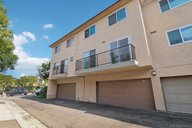 view of building exterior with a garage