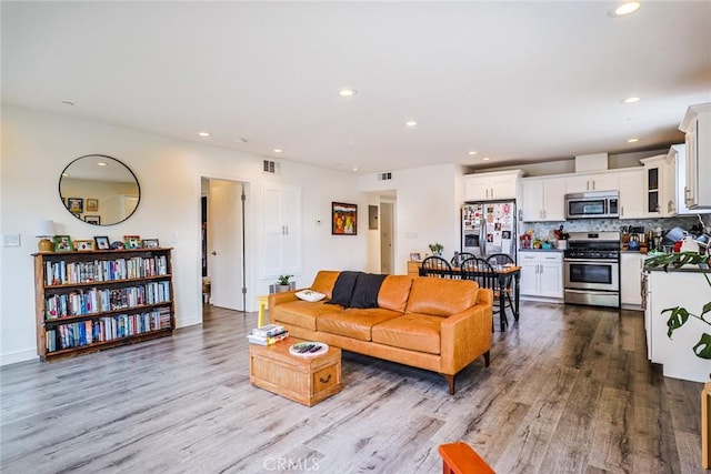 living room featuring light hardwood / wood-style flooring